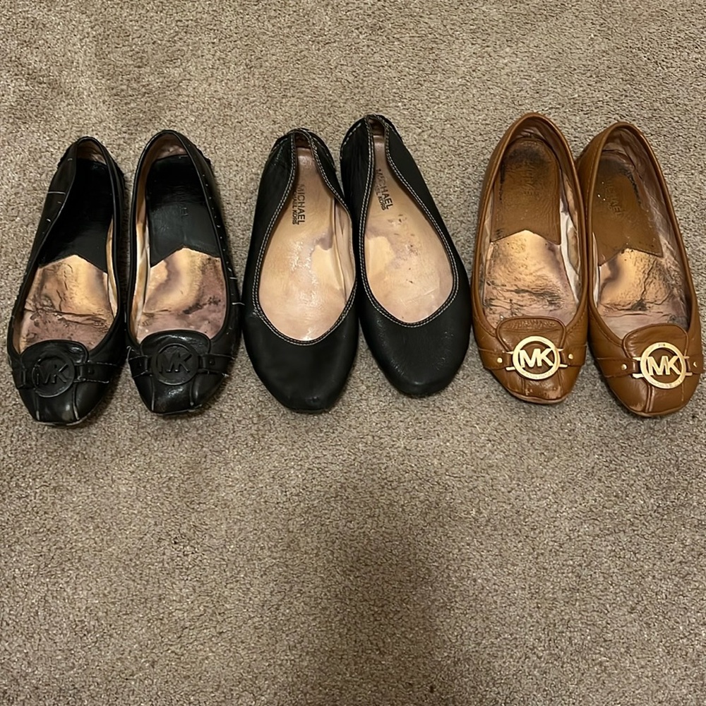 3 pairs of MK flats (2 black &1 brown )